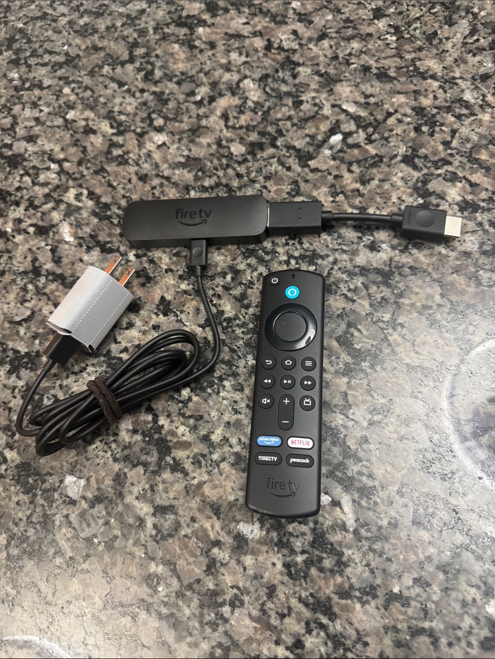 Amazon Fire TV Stick Streaming Device with Black Voice Remote and Power Cable